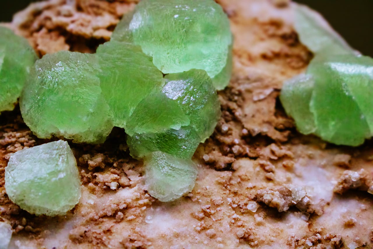Crafting Captivating Headlines: Your awesome post title goes here Close-up of bright green crystals on a textured mineral surface, showcasing natural beauty.